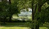 Wonderful views from the private garden through a copse and across the valley. - Thumbnail Image