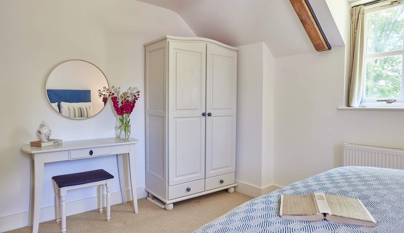 Plenty of storage and a dressing area in the primary.