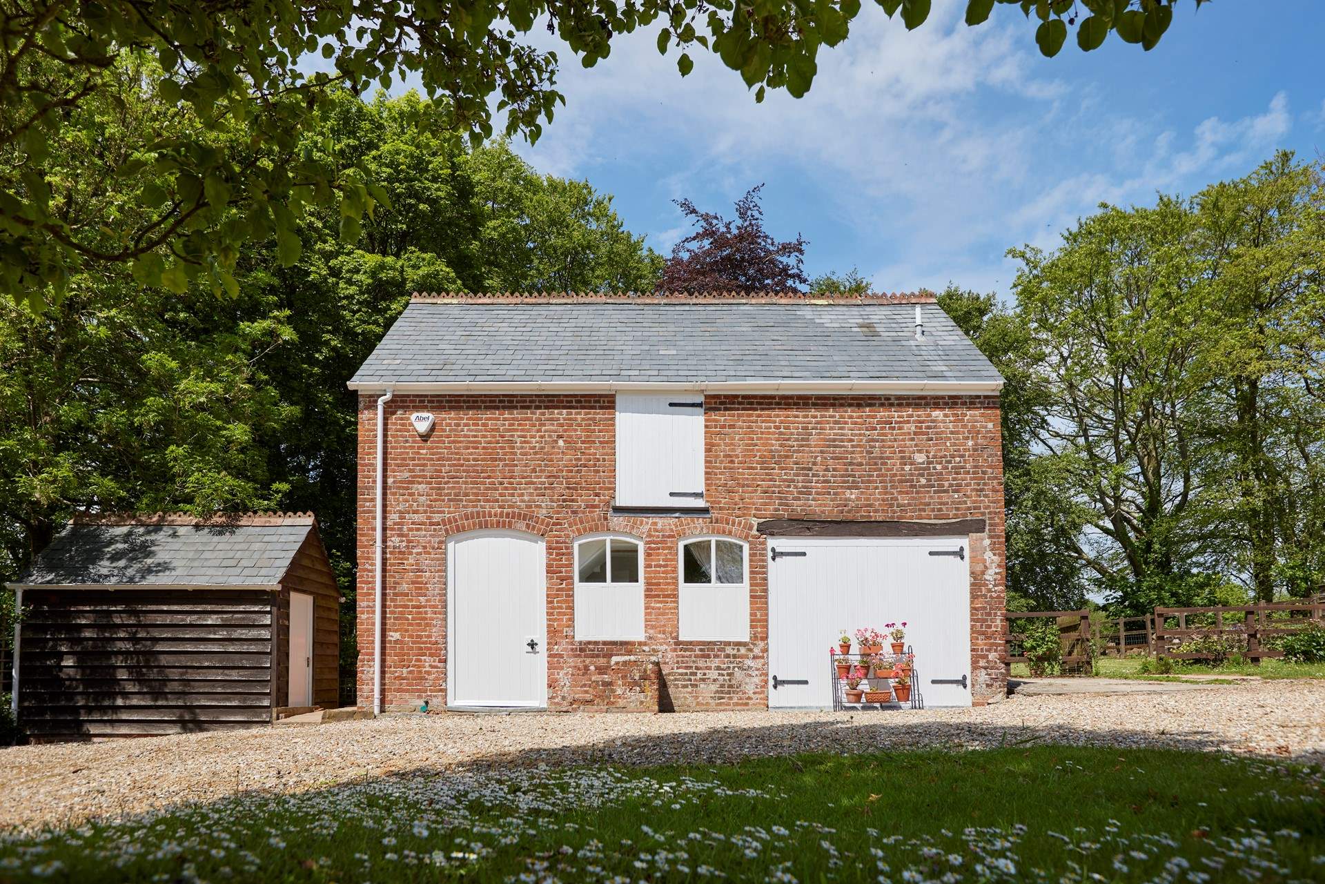 The Old Coach House is a striking sight as you enter the driveway and ample parking area.