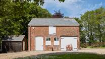 The Old Coach House is a striking sight as you enter the driveway and ample parking area.