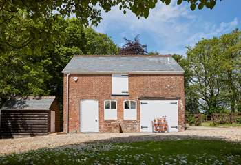The Old Coach House is a striking sight as you enter the driveway and ample parking area.