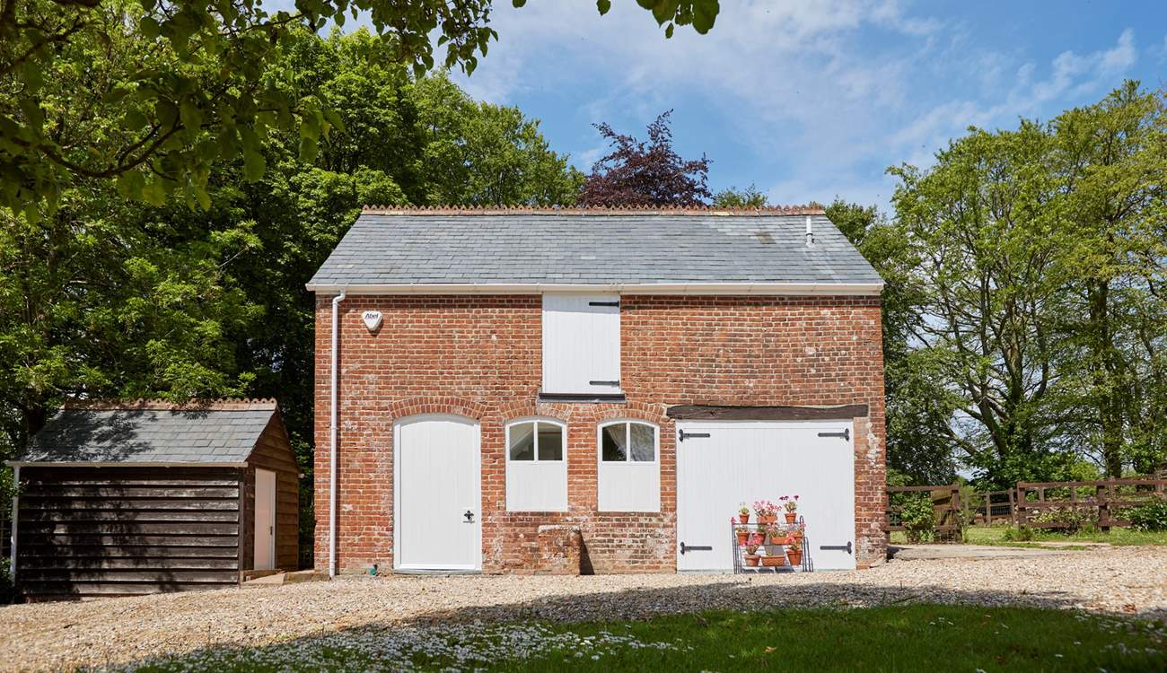 The Old Coach House is a striking sight as you enter the driveway and ample parking area.