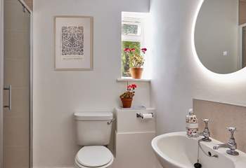 The newly remodelled shower-room is sharp and contemporary with a large shower enclosure and anti-mist mirror.