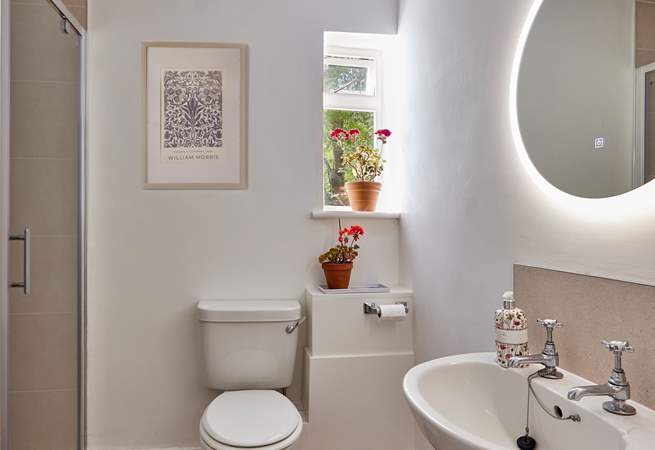 The newly remodelled shower-room is sharp and contemporary with a large shower enclosure and anti-mist mirror.