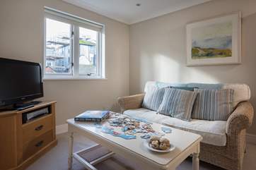 The second sitting-room is great for children and a large collection of books, games and DVDs are provided.
