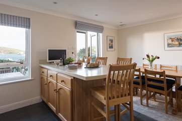 A big breakfast bar provides lots of space for meal preparation.