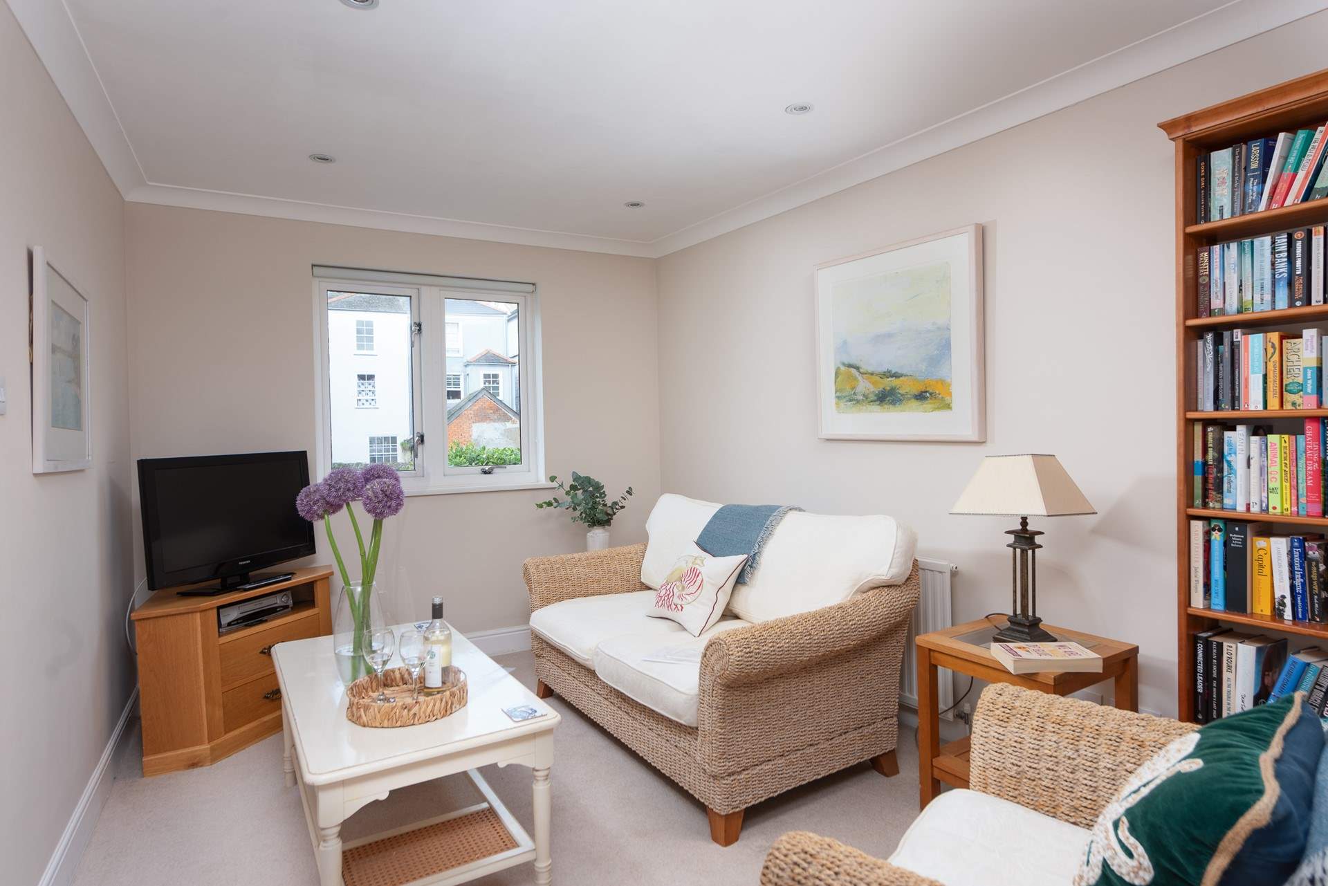 The second sitting-room is a cosy space and home to a large collection of books, games and DVDs.