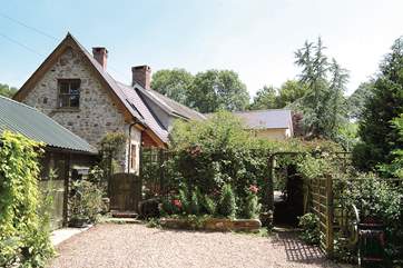 The cottage has plenty of parking space and an enclosed terrace/patio.