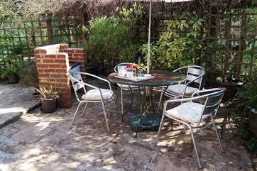 The pretty courtyard garden has a brick built barbecue for you to enjoy.
