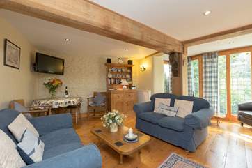 The dining-table is in the corner of this room - there is plenty of space to pull it out if you wish.