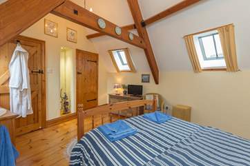 The Velux windows to both sides of the bedroom let in plenty of light.