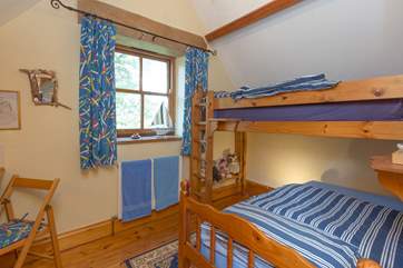 This is the second bedroom - the bunk-room - and please note that the bunks are 3ft beds so good for adults too.