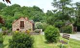 Leat Mill looks out over private fields and woodland and has a gated sun-trap patio in front of the cottage. - Thumbnail Image