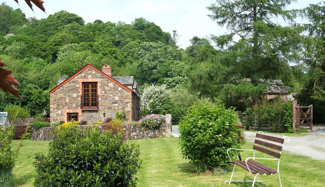 Leat Mill looks out over private fields and woodland and has a gated sun-trap patio in front of the cottage.