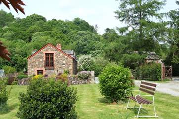 Leat Mill looks out over private fields and woodland and has a gated sun-trap patio in front of the cottage.
