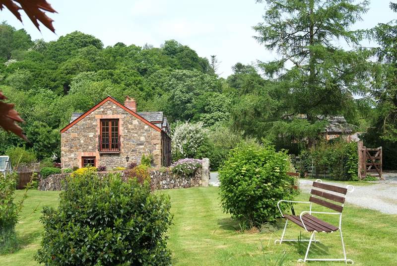Leat Mill looks out over private fields and woodland and has a gated sun-trap patio in front of the cottage.