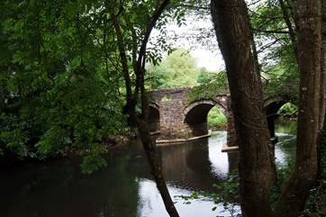 To reach the cottage, you cross a small bridge and take the lane down beside the river.