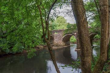 To reach the cottage, you cross a small bridge and take the lane down beside the river.