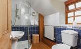 Cheerful blue and white bathroom on the first floor.  - Thumbnail Image