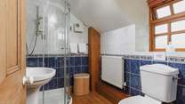 Cheerful blue and white bathroom on the first floor. 