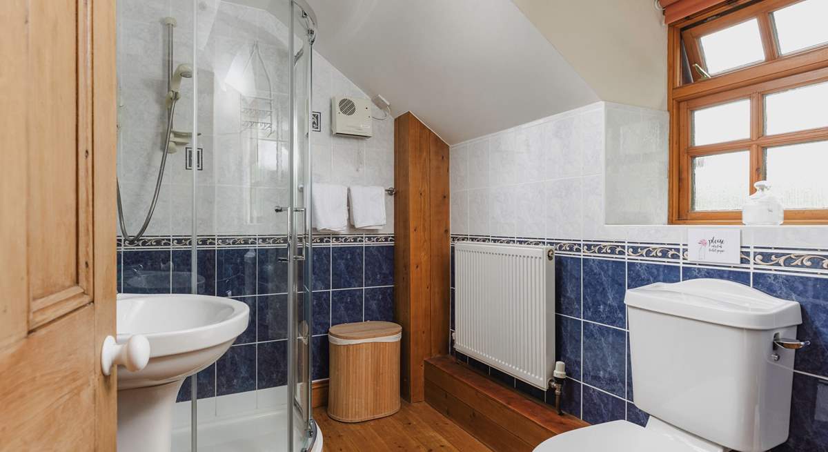 Cheerful blue and white bathroom on the first floor. 