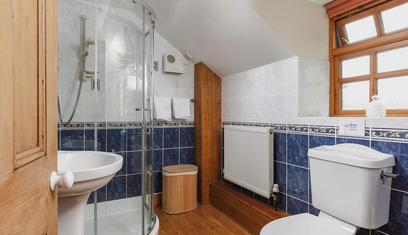 Cheerful blue and white bathroom on the first floor. 