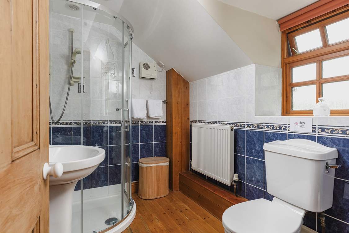 Cheerful blue and white bathroom on the first floor.