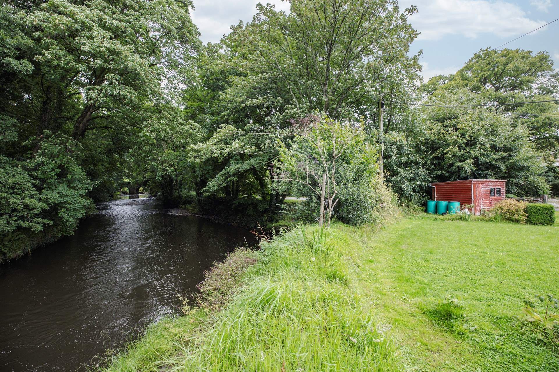 The picnic spot and river is shared with your neighbours. 