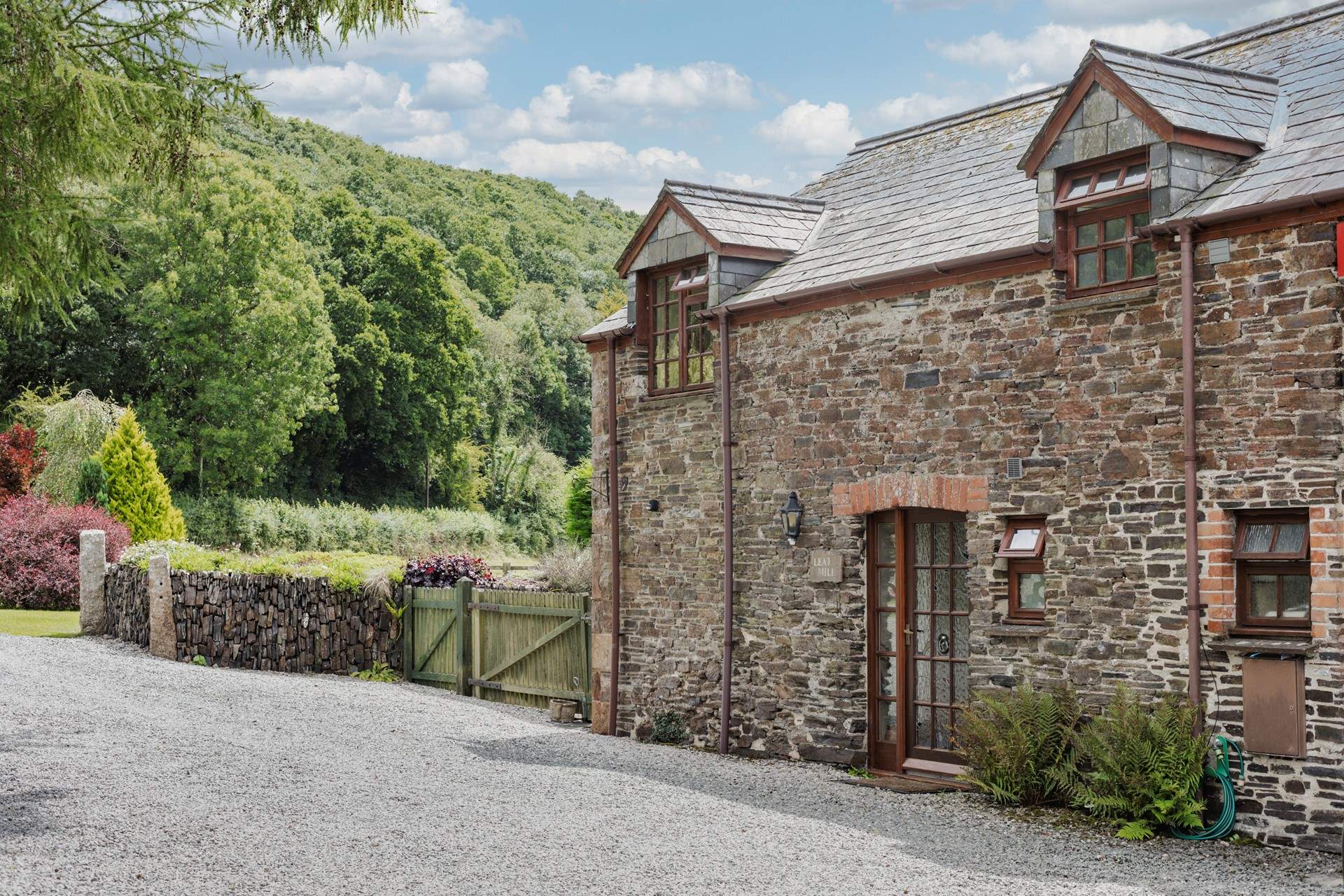 The front of Leat Mill as you come along the lane.