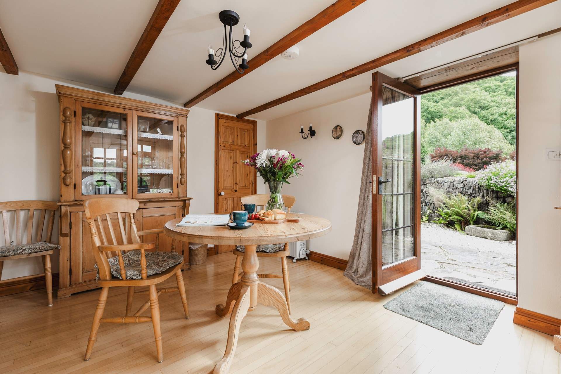 The back door leads out from the dining-area to the sheltered patio.
