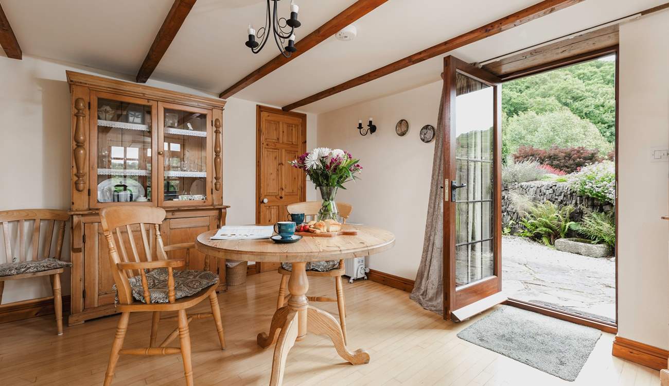 The back door leads out from the dining-area to the sheltered patio.