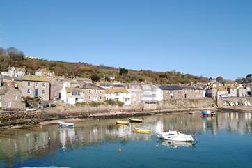 Mousehole Harbour is just four miles away.