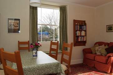 The kitchen/dining-room is a real family space, with a sofa, books and toys for children.