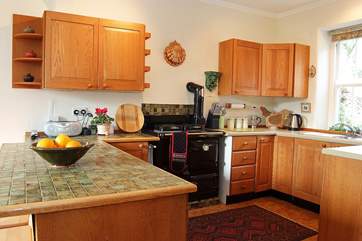 The kitchen-area is well-equipped, with a fully fitted back kitchen in the next room.