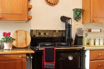 The Rayburn provides heat, hot water and cooking facilities all year round, backed up by a full central heating and hot water system.