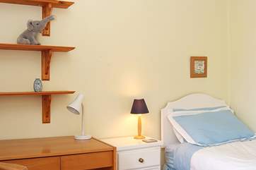 Bedroom 3 has a single bed and ample room for the travel cot.