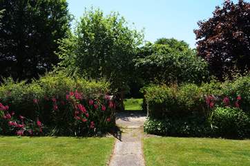 Looking through the gate opposite the entrance to Bay Tree Farmhouse, into the owners' garden (which guests are welcome to use).