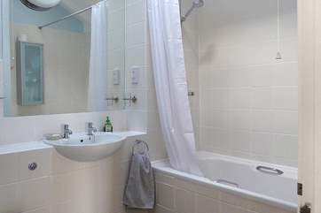 The bathroom is spacious and light (the bathroom has recently been refurbished and new photographs are to follow).