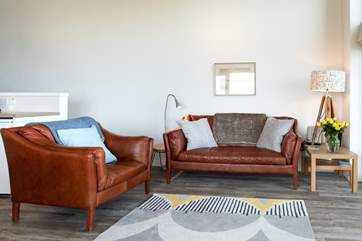 The comfortable seating where you can lounge in front of the fire.