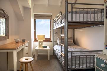 The second bedroom with bunk-beds.