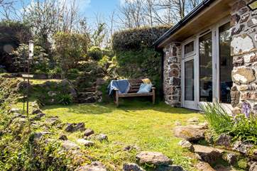 The doors from the master bedroom open straight out to the garden - perfect for your morning coffee.