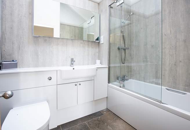 The family bathroom is spacious and light - perhaps enjoy listening to some classical music in the bath?
