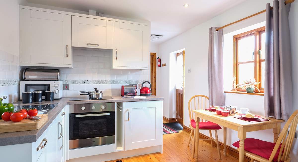 The kitchen and dining-area.