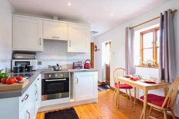 The kitchen and dining-area.