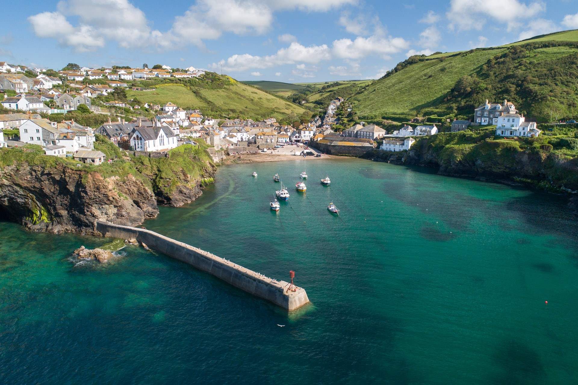 Ever popular Port Isaac. Pop along and perhaps you will spot the Fishermen's Friends singing on the quayside. 