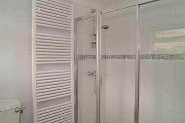 The shower-room on the ground floor has a double shower cubicle.