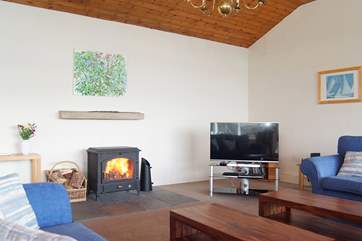 The wood-burner will keep everyone toasty warm whatever the weather outside.