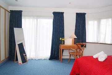 There are doors from Bedroom 1 out to the terrace.