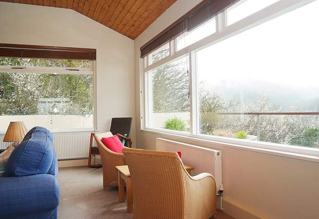 There are superb views across the river from the sitting-room, bedrooms and garden.