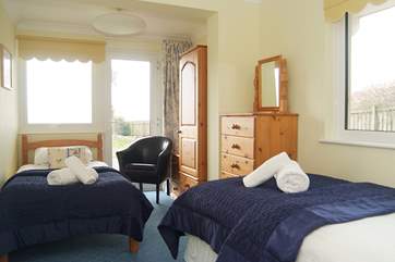 Bedroom 4 (ground floor) has twin beds.